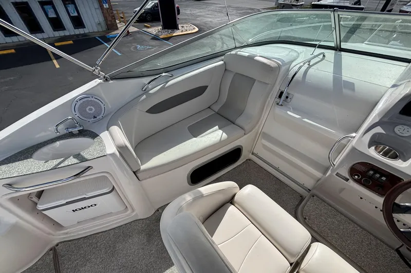 Slide: The Image of 2007 Chaparral Signature 250 boat interior with seating and dashboard view. - 15