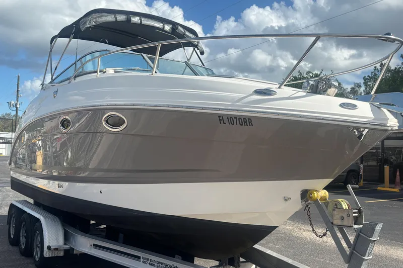 Slide: The Image of 2007 Chaparral Signature 250 boat on trailer under cloudy sky. - 5