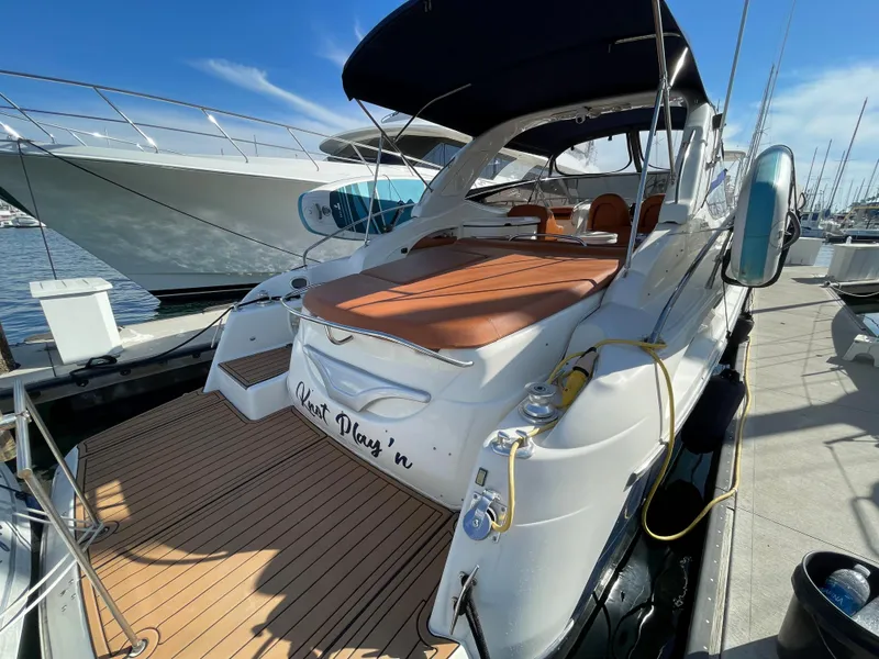 Slide: The Image of 2004 Cranchi Endurance 41 yacht docked at marina. - 13