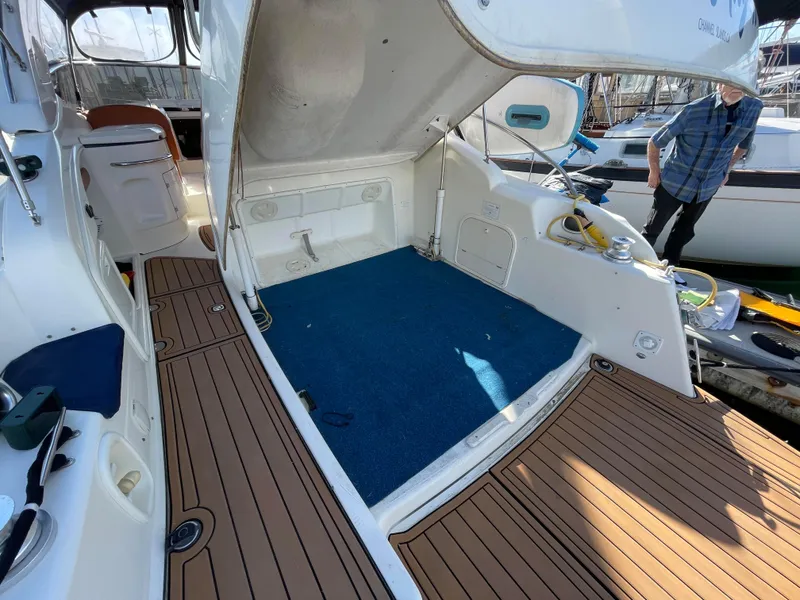 Slide: The Image of Interior of a 2004 Cranchi Endurance 41 yacht with open storage area. - 15