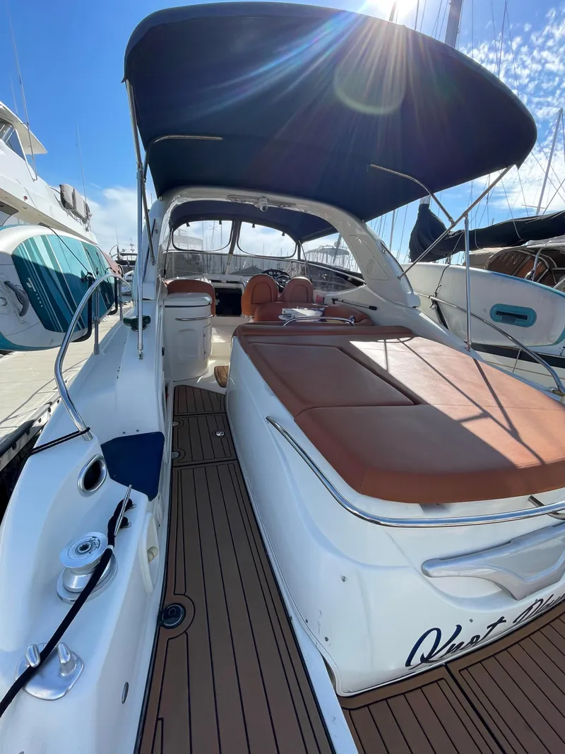 Slide: The Image of 2004 Cranchi Endurance 41 yacht with sunshade in harbor. - 18