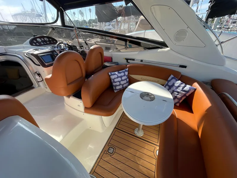 Slide: The Image of Interior of a 2004 Cranchi Endurance 41 yacht with leather seating and table. - 20