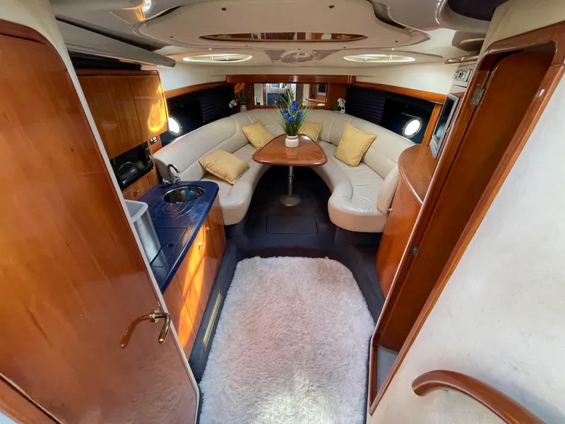 Slide: The Image of Interior of 2004 Cranchi Endurance 41 yacht with elegant seating area. - 3
