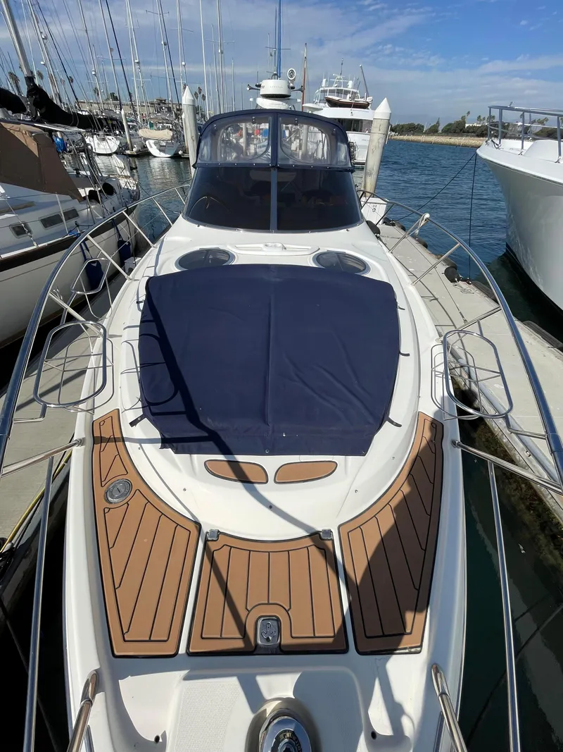 Slide: The Image of 2004 Cranchi Endurance 41 yacht docked at marina. - 30