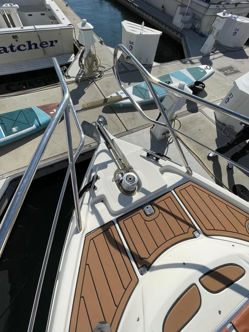 Slide: The Image of Bow of a 2004 Cranchi Endurance 41 boat docked in marina. - 32