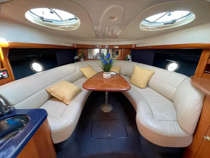 Slide: The Image of Interior of 2004 Cranchi Endurance 41 yacht with elegant seating area. - 4