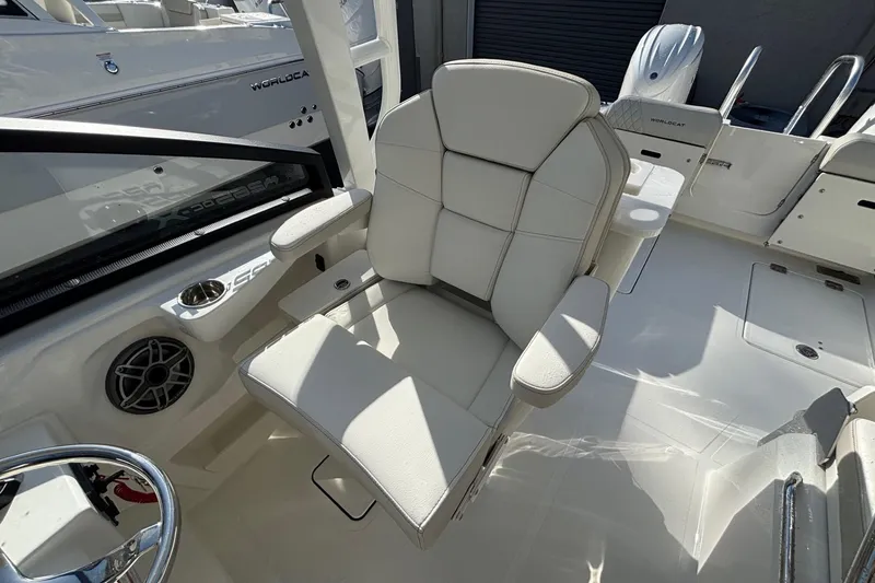 Slide: The Image of Luxury seating on 2026 World Cat 265 DC-X boat, featuring sleek design and comfort. - 4