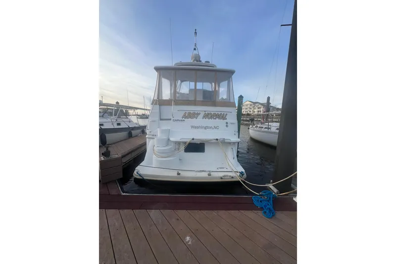 Slide: The Image of 2004 Carver 366 Motor Yacht docked in Washington, NC marina. - 14
