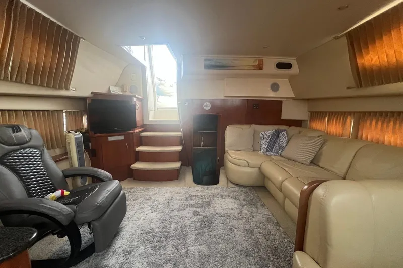 Slide: The Image of Luxurious interior of 2004 Carver 366 Motor Yacht with plush seating and modern amenities. - 9