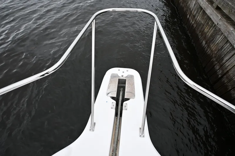 Slide: The Image of Bow view of 1996 Bayliner 4087 Aft Cabin Motoryacht with anchor and railing. - 14