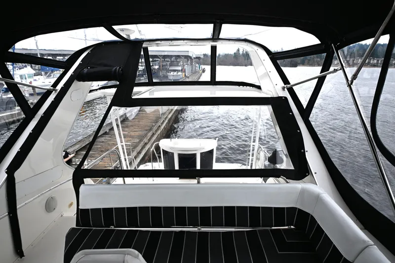 Slide: The Image of 1996 Bayliner 4087 Aft Cabin Motoryacht interior with marina view. - 23