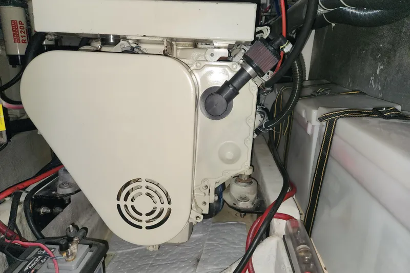 Slide: The Image of Engine compartment of a 1996 Bayliner 4087 Aft Cabin Motoryacht, showcasing mechanical components. - 66
