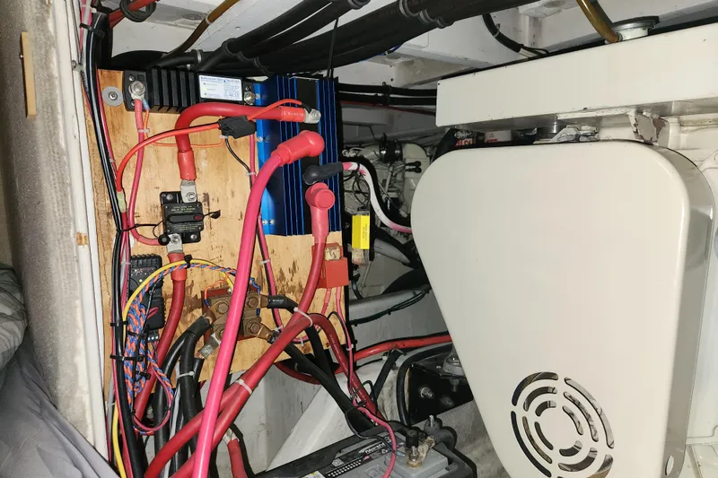 Slide: The Image of Engine compartment of 1996 Bayliner 4087 Aft Cabin Motoryacht with wiring and components. - 67
