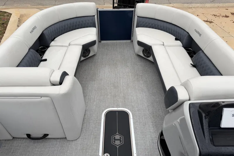 Slide: The Image of Luxurious interior of 2025 Harris Sunliner 230 pontoon boat with plush seating. - 4