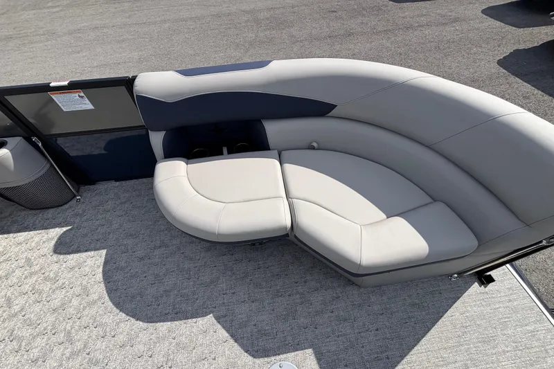 Slide: The Image of 2026 Berkshire 22UL LE B boat interior with curved seating and modern design. - 6