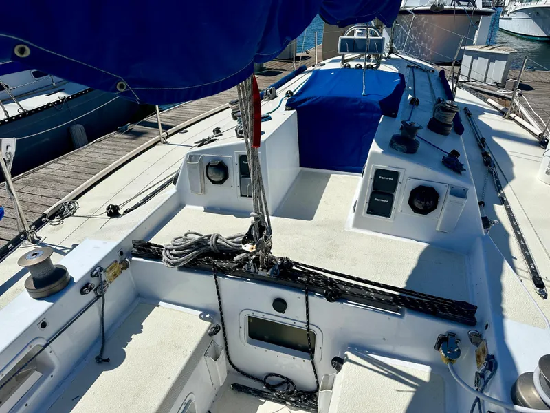 Slide: The Image of 1982 Schock NY 36 sailboat at dock, deck view. - 10