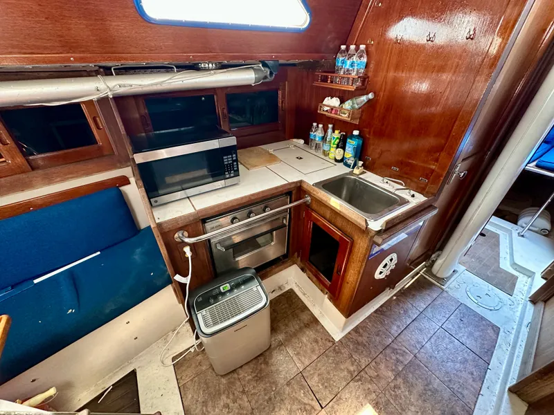 Slide: The Image of Galley area of a 1982 Schock NY 36 yacht. - 15