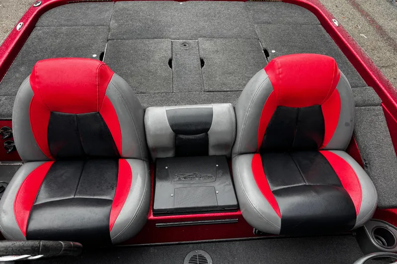 Slide: The Image of 2012 Skeeter ZX200 boat seats, red and black upholstery, top view. - 19