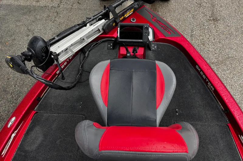 Slide: The Image of Open storage compartment of 2012 Skeeter ZX200 boat, showcasing interior space. - 22