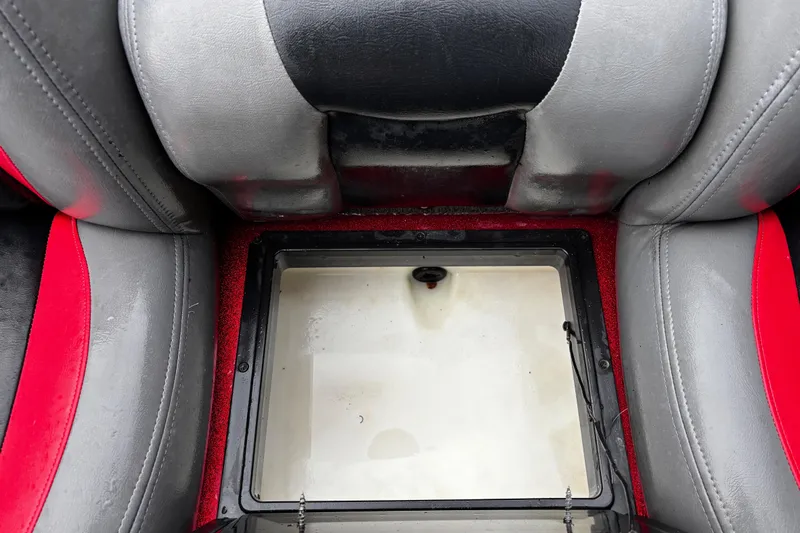 Slide: The Image of Close-up of a 2012 Skeeter ZX200 boat component with water droplets. - 30