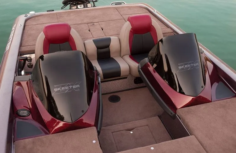 Slide: The Image of 2012 Skeeter ZX200 boat on trailer at dealership, overcast day. - 6