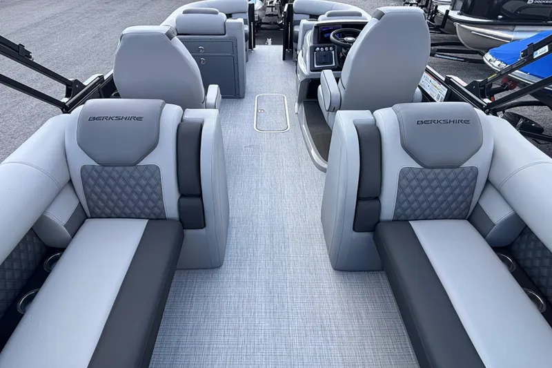 Slide: The Image of 2026 Berkshire 23RFX STS boat interior with luxurious seating and modern design. - 8