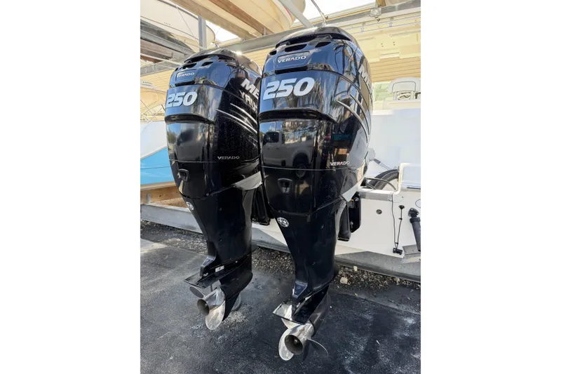 Slide: The Image of Twin Mercury Verado 250 outboard engines on a 2003 Wellcraft 270 Coastal O/B boat. - 3