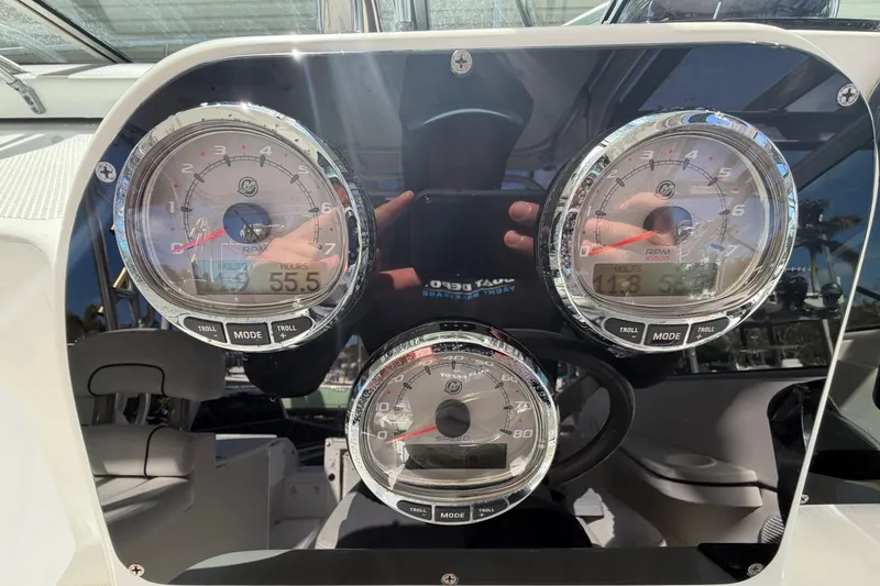 Slide: The Image of Dashboard of 2003 Wellcraft 270 Coastal O/B boat with RPM gauges. - 7