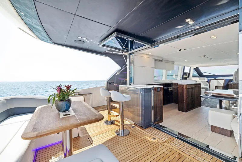 Slide: The Image of Luxurious interior of 2024 Fairline Squadron 68 yacht with ocean view. - 12