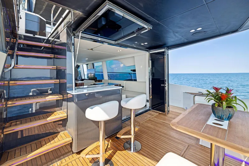 Slide: The Image of Luxurious interior of 2024 Fairline Squadron 68 yacht with ocean view. - 13