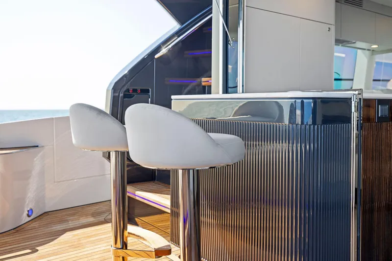Slide: The Image of Luxury seating area on 2024 Fairline Squadron 68 yacht deck. - 15