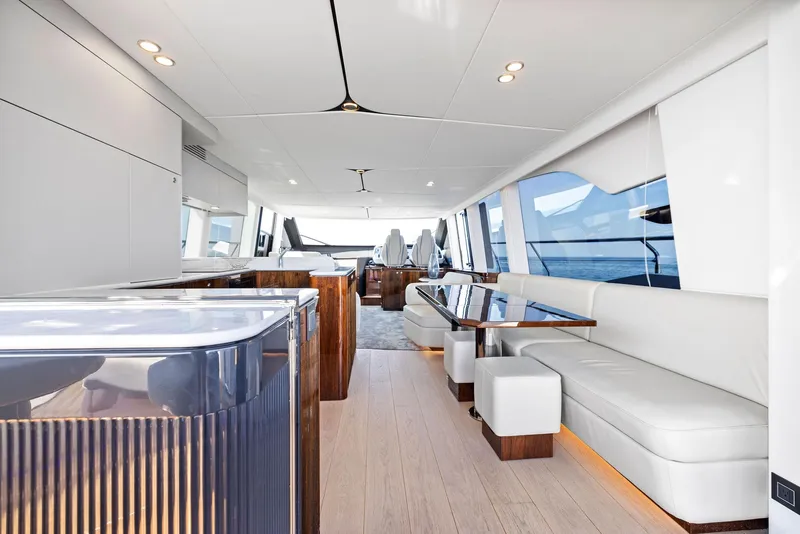 Slide: The Image of Luxurious interior of 2024 Fairline Squadron 68 yacht with modern seating and sleek design. - 16