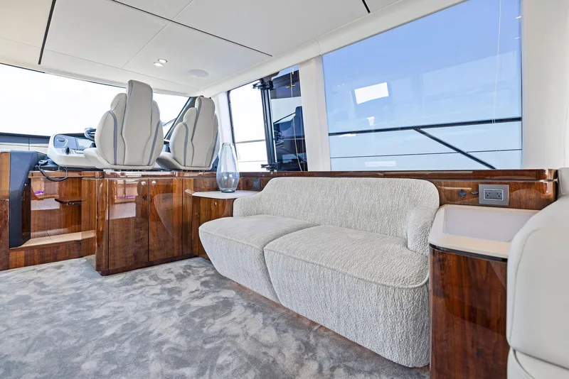 Slide: The Image of Luxurious interior of 2024 Fairline Squadron 68 yacht with plush seating and elegant design. - 22