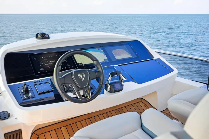 Slide: The Image of Fairline Squadron 68 yacht helm, 2027 model, overlooking the sea. - 46
