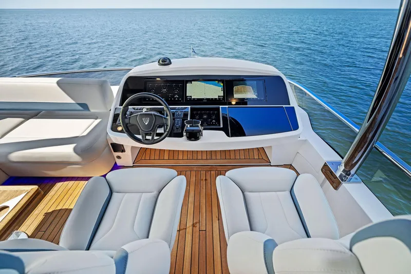 Slide: The Image of Cockpit of Fairline Squadron 68 yacht, 2027 model, featuring modern design. - 47