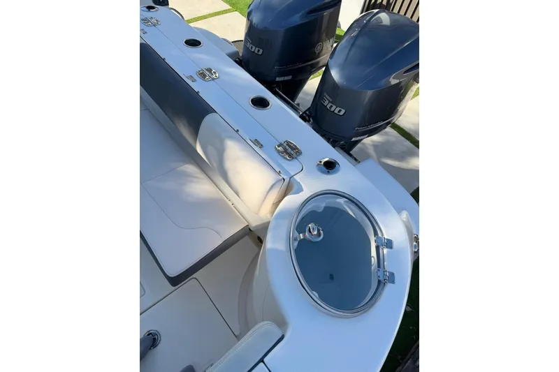 Slide: The Image of 2017 Robalo R302 Center Console boat with dual 300 horsepower engines. - 19