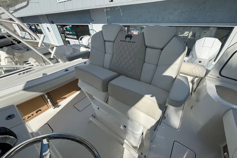 Slide: The Image of 2026 World Cat 265 CC-X boat interior with luxurious seating and modern design. - 7