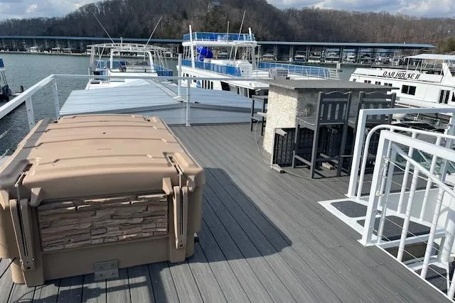 Slide: The Image of Rooftop deck of 2021 Harbor Cottage houseboat with scenic marina view. - 34