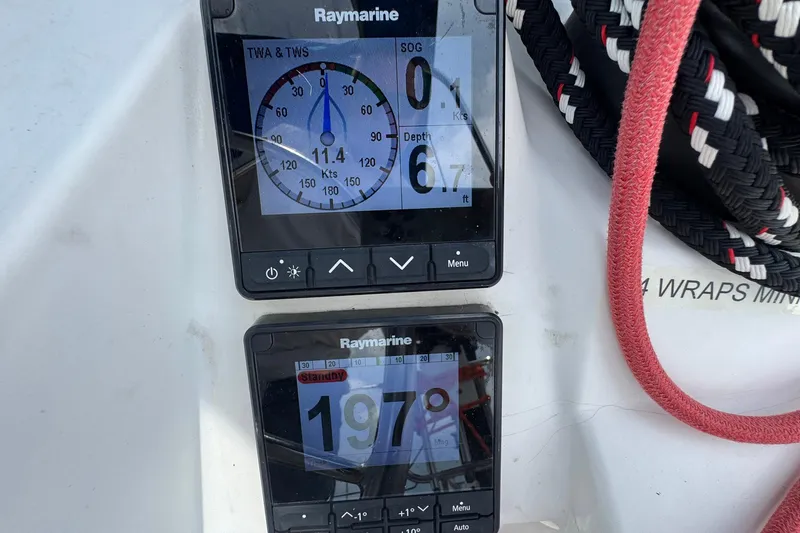 Slide: The Image of Raymarine navigation displays on 2018 Jeanneau Sun Odyssey 389 sailboat, showing speed and heading. - 24