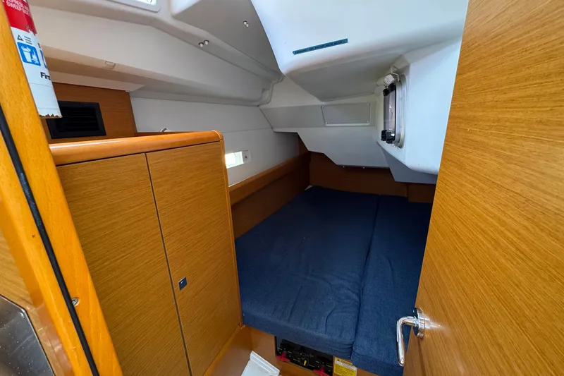Slide: The Image of Cozy cabin interior of 2018 Jeanneau Sun Odyssey 389 sailboat with wooden finish. - 41