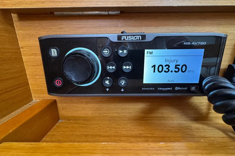 Slide: The Image of Fusion MS-AV750 stereo system on Jeanneau Sun Odyssey 389, 2018 model, displaying FM 103.50 MHz. - 47