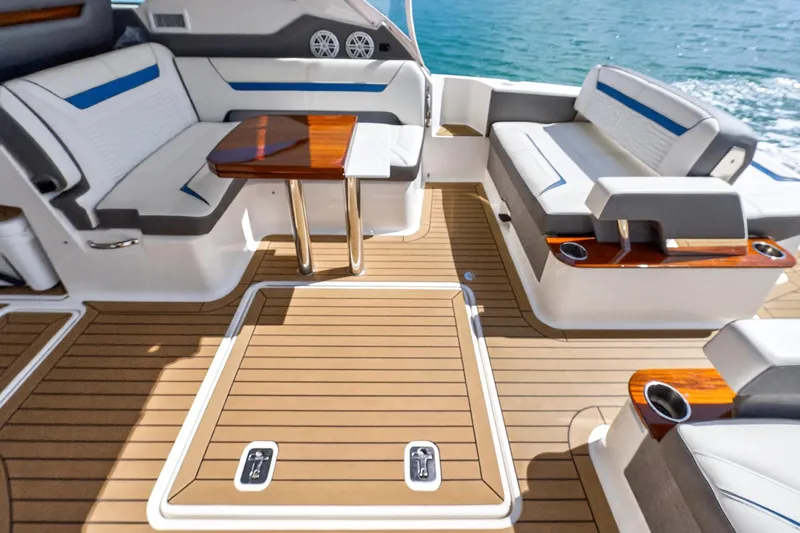 Slide: The Image of Luxurious 2022 Tiara Yachts 38 LX interior with elegant seating and wooden accents. - 18