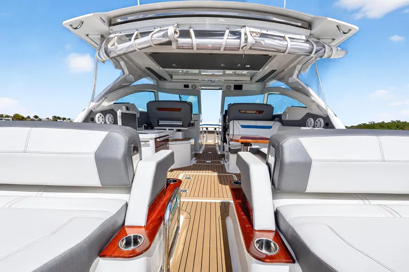 Slide: The Image of 2022 Tiara Yachts 38 LX interior with luxurious seating and sleek design. - 20