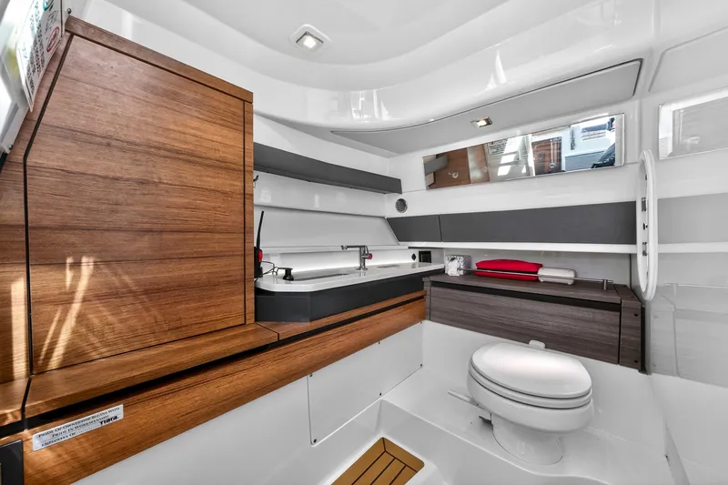 Slide: The Image of Luxurious 2022 Tiara Yachts 38 LX bathroom with modern wood and sleek design. - 41