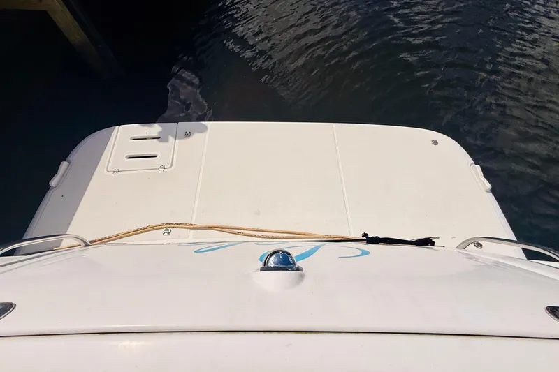 Slide: The Image of 2005 Tiara Yachts 3600 Sovran boat stern view at dock. - 10