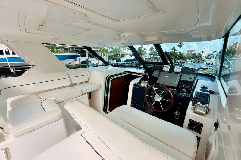 Slide: The Image of 2005 Tiara Yachts 3600 Sovran interior with helm, seating, and navigation equipment. - 25