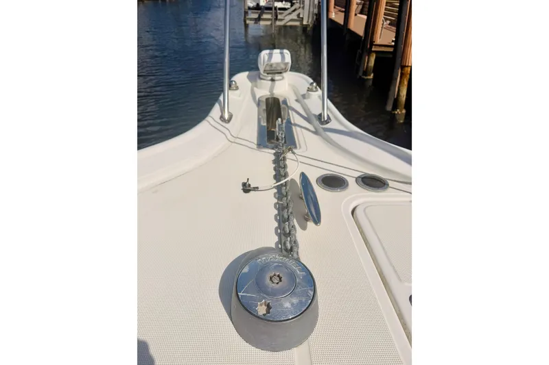 Slide: The Image of 2005 Tiara Yachts 3600 Sovran deck with anchor chain and winch. - 54