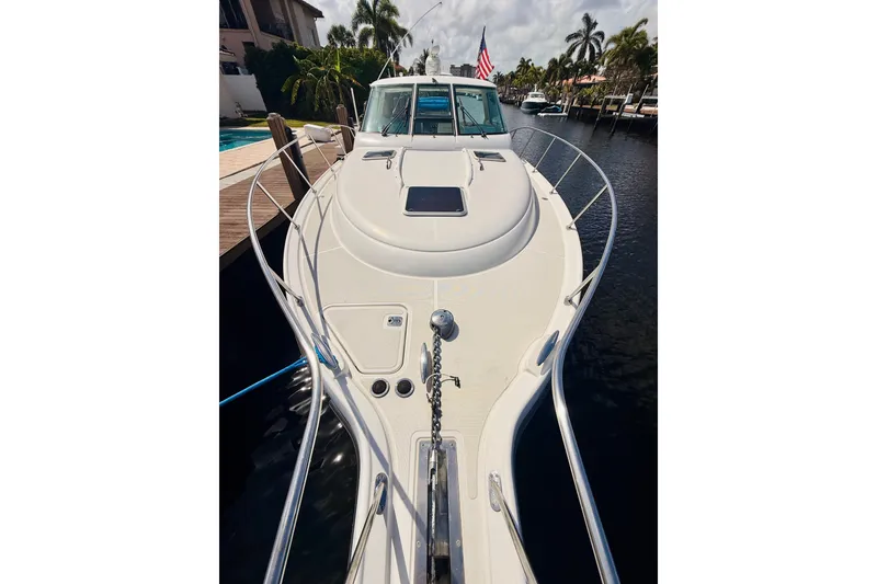 Slide: The Image of 2005 Tiara Yachts 3600 Sovran docked, showcasing sleek design and spacious deck. - 55