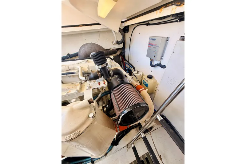 Slide: The Image of Engine compartment of 2005 Tiara Yachts 3600 Sovran, showcasing mechanical components and systems. - 67