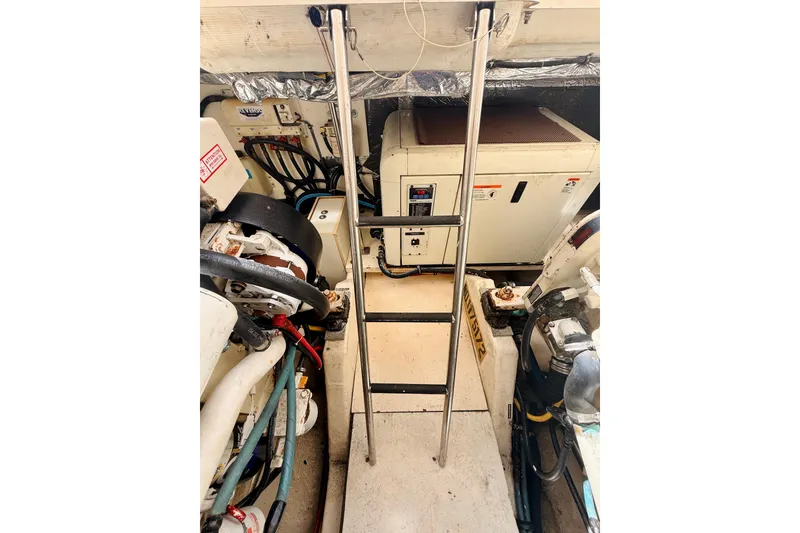Slide: The Image of Engine room of 2005 Tiara Yachts 3600 Sovran with ladder and equipment. - 71